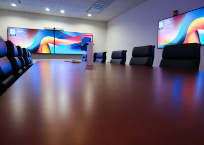 A conference room designed to provide Microsoft Teams and Zoom meetings for commercial businesses and corporate offices.