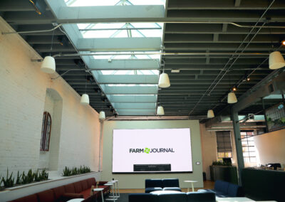 Modern conference room with integrated audio, video, and lighting design in Kansas City office