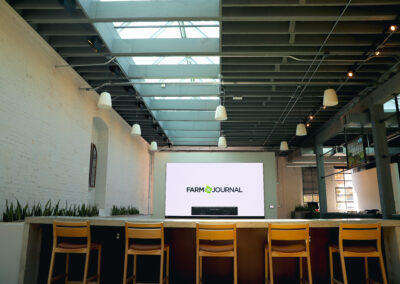Modern conference room with integrated audio, video, and lighting design in Kansas City office