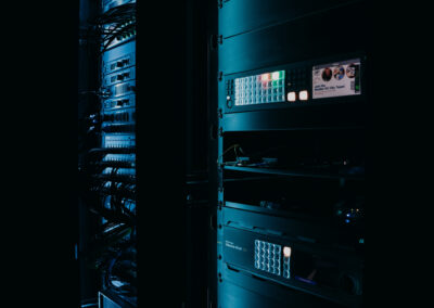 Backstage view of professional stage lighting fixtures at Abundant Life Johnson County