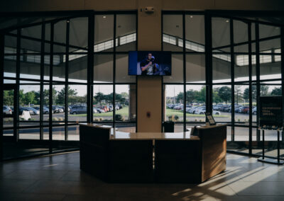 Entryway at Abundant Life Church Johnson County with video wall and integrated lighting