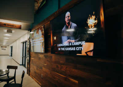 Lobby of Abundant Life Johnson County campus featuring welcoming lighting design and digital signage