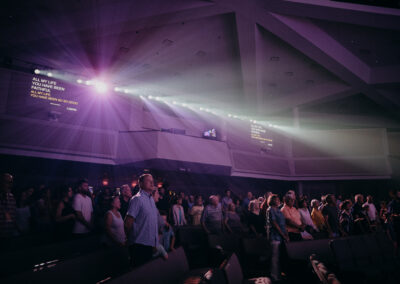 Stage lighting rig with spotlights and LED fixtures at Abundant Life Johnson County